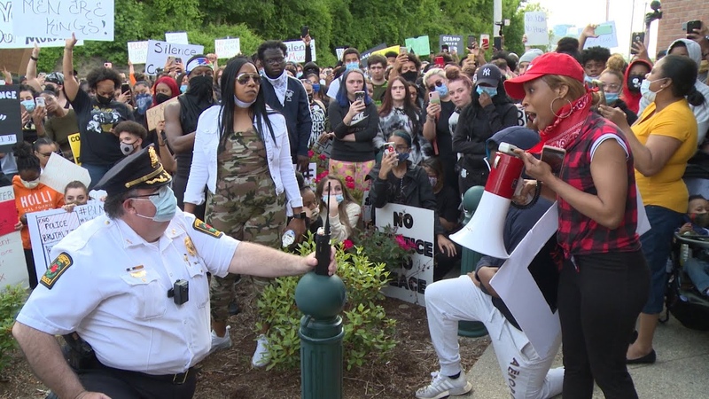 Police and protesters meet during Black Lives Matter event in