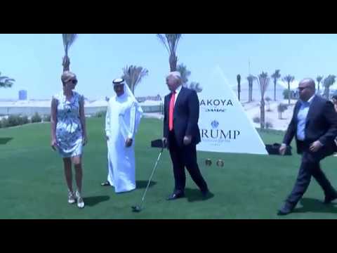 Donald Trump hits golf ball in desert and wants to frame it