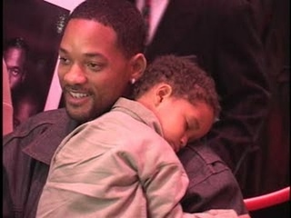 WILL SMITH brings sleeping toddler JADEN to play opening