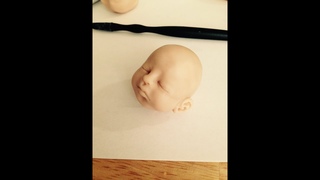 Photo Series of How to Sculpt a Polymer Clay Baby Face and Head