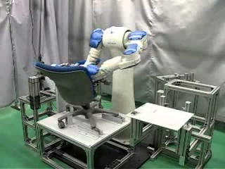 Motoman DA20 dual arm robot assembling a chair