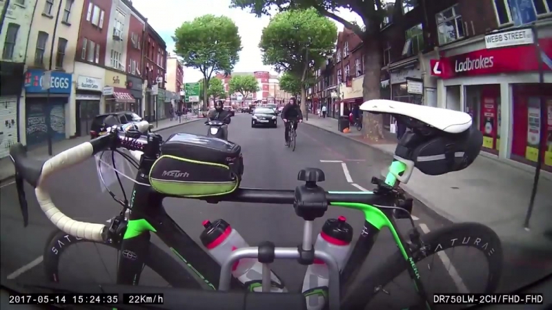 Thief tries to steal bike off the back of a