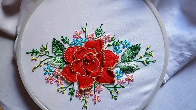 Hand embroidery. Fantasy rose flower embroidery