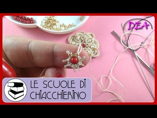 Tut.a.- Raggiera di perline al centro di un fiore.